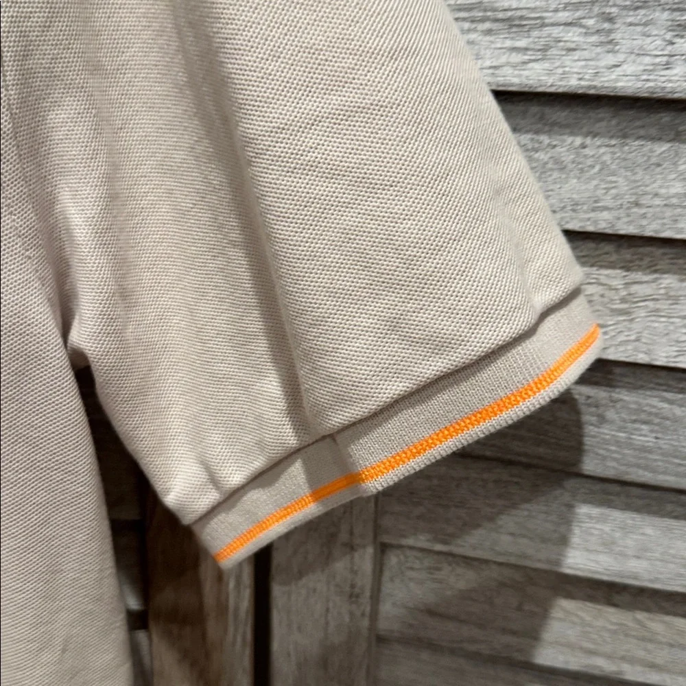 116. Psycho Bunny Men’s Tan Polo with Orange Details pre owned size 7